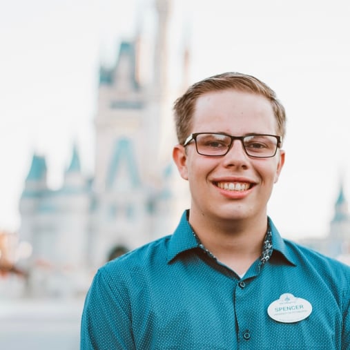 Spencer Zacher in front of Cinderella's Castle at Walt Disney World
