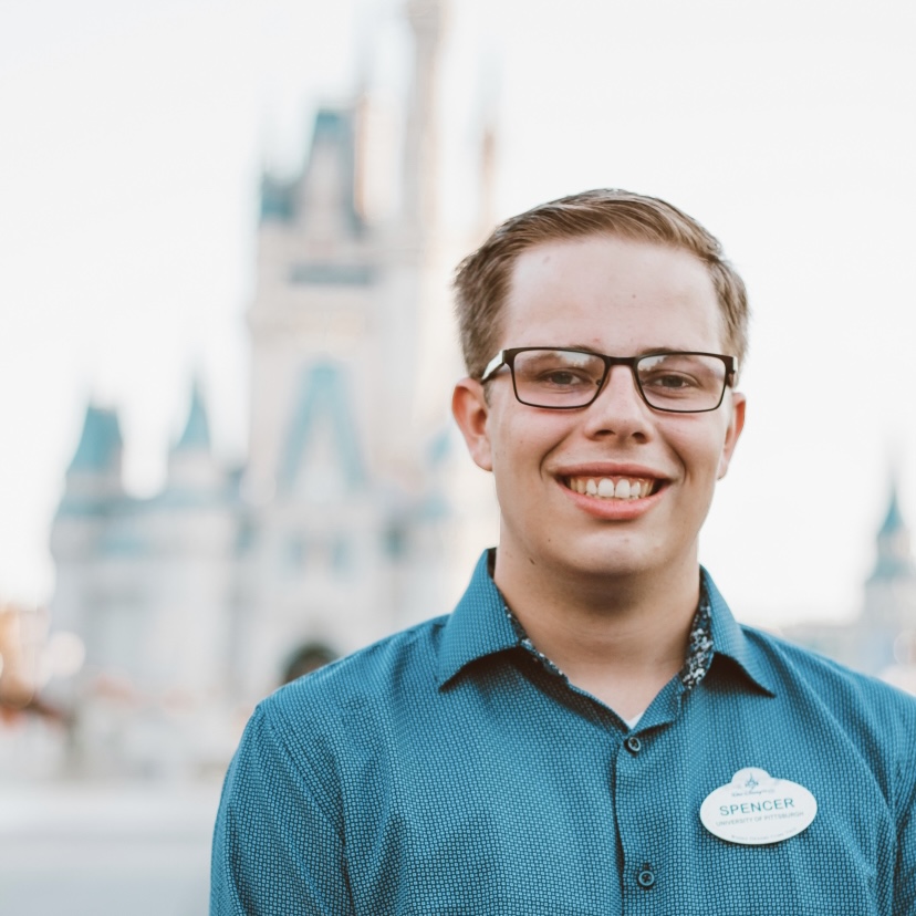 Spencer Zacher in front of Cinderella's Castle at Walt Disney World